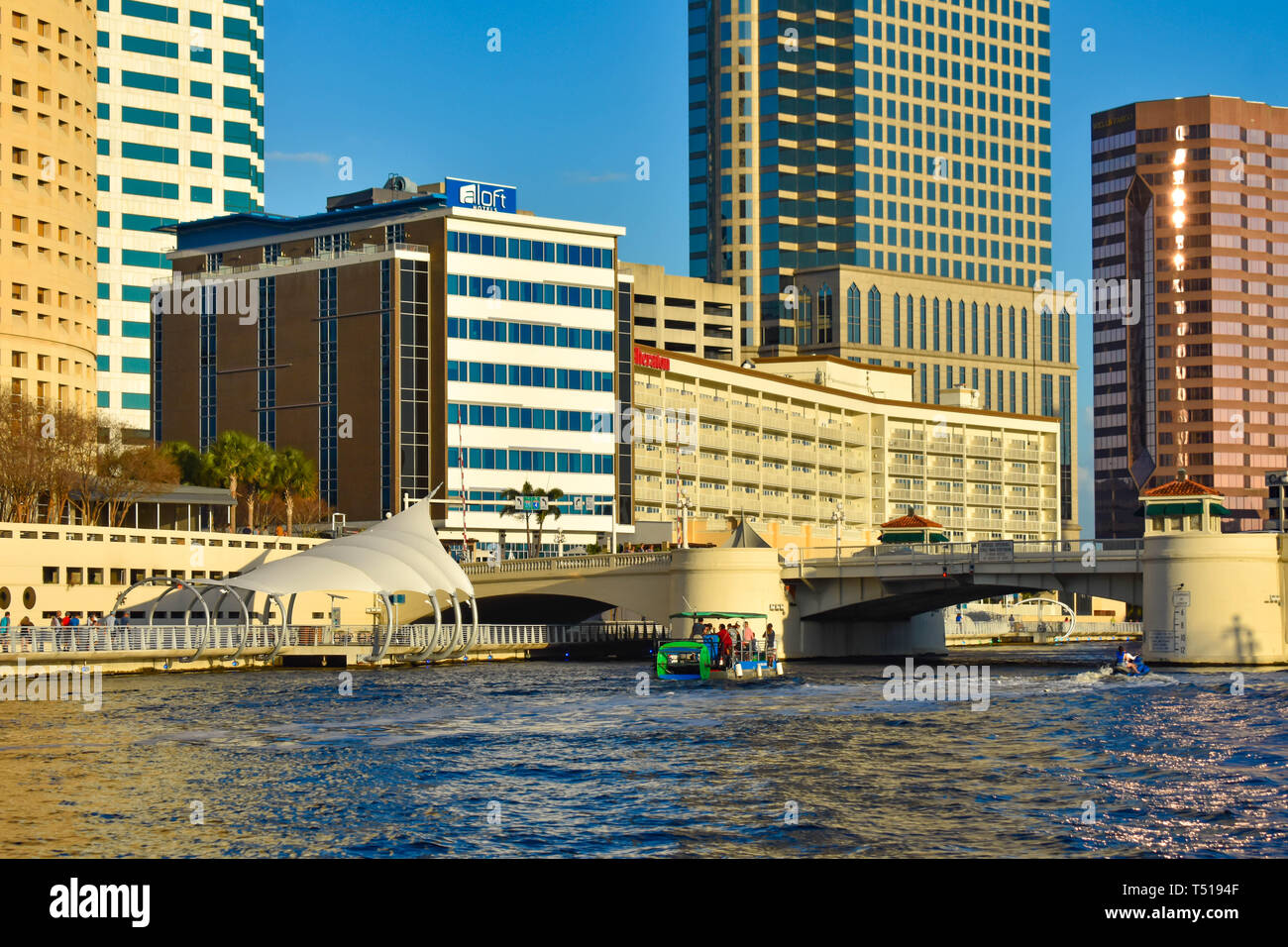 Tampa Bay, Florida. March 02, 2019 . Pedal boat and jet ski sailing on
