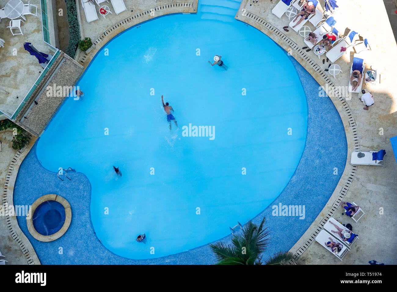 Cartagena Colombia,El Lagito,Hotel Dann,hotel,pool,amenity,Hispanic resident,residents,guests,man men male,swimming,lounging,aerial overhead view,COL1 Stock Photo
