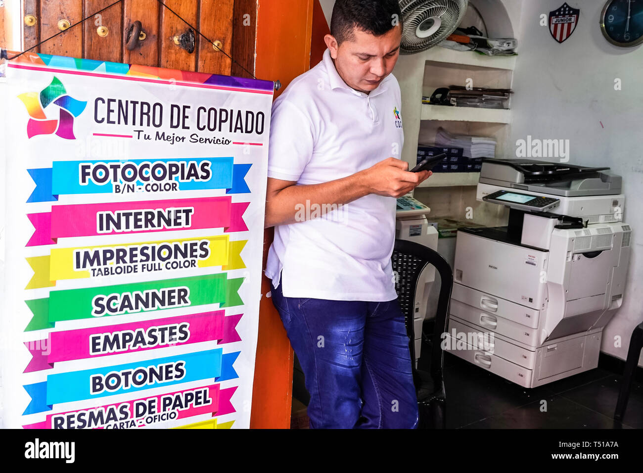 Cartagena Colombia,printing photocopying shop,sign,Spanish language,Hispanic resident residents,man men male,copy center centre,COL190123086 Stock Photo