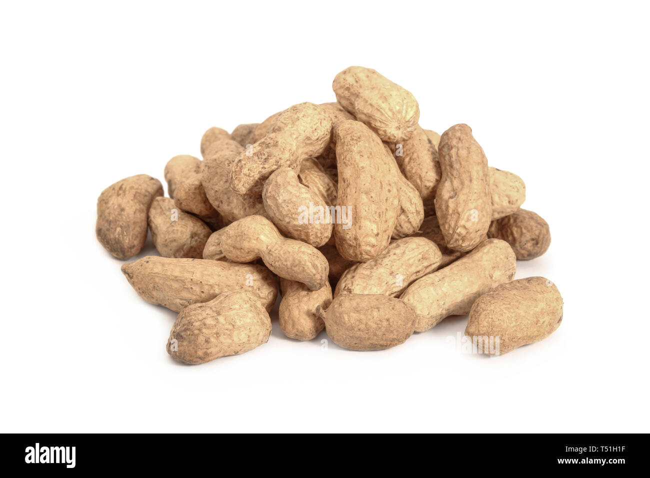 A handful of peeled peanut isolated on white Stock Photo