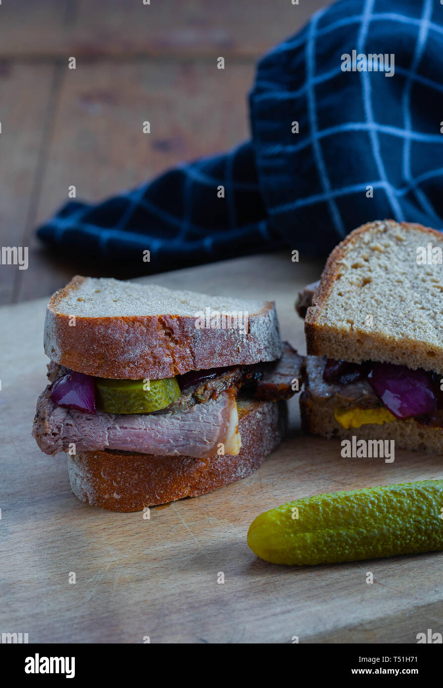 Roast beef sandwich with pickle and mustard Stock Photo Alamy