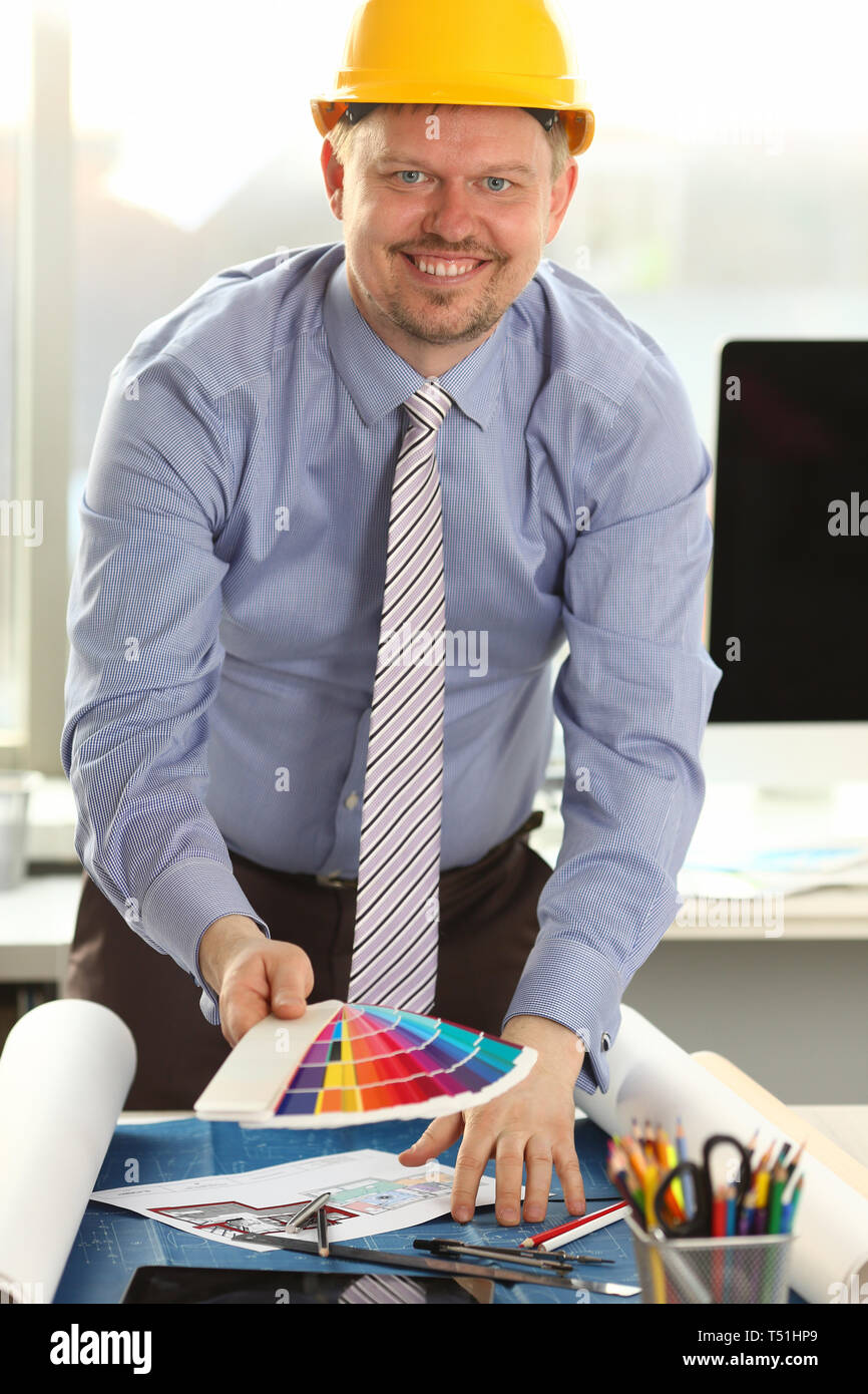 Smiling Male Architect Drawing Building Sketch Stock Photo - Alamy