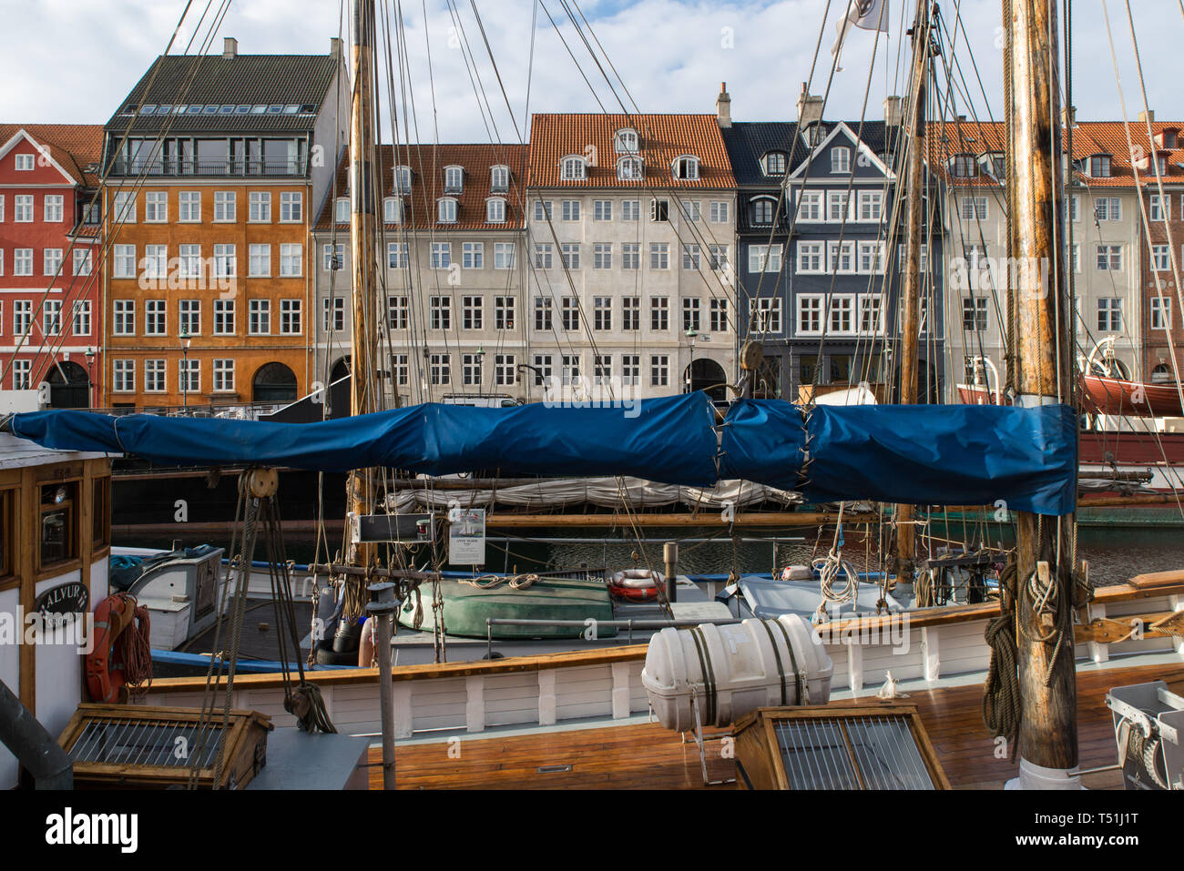 Sailing boats in Nyhavn, the 17th century waterfront in Copenhagen, Denmark. Stock Photo