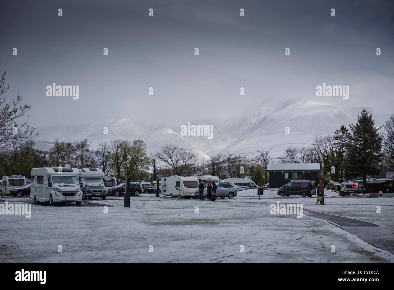 Camping and Caravanning Club site with Spring snow at Keswick, Cumbria, UK. Stock Photo