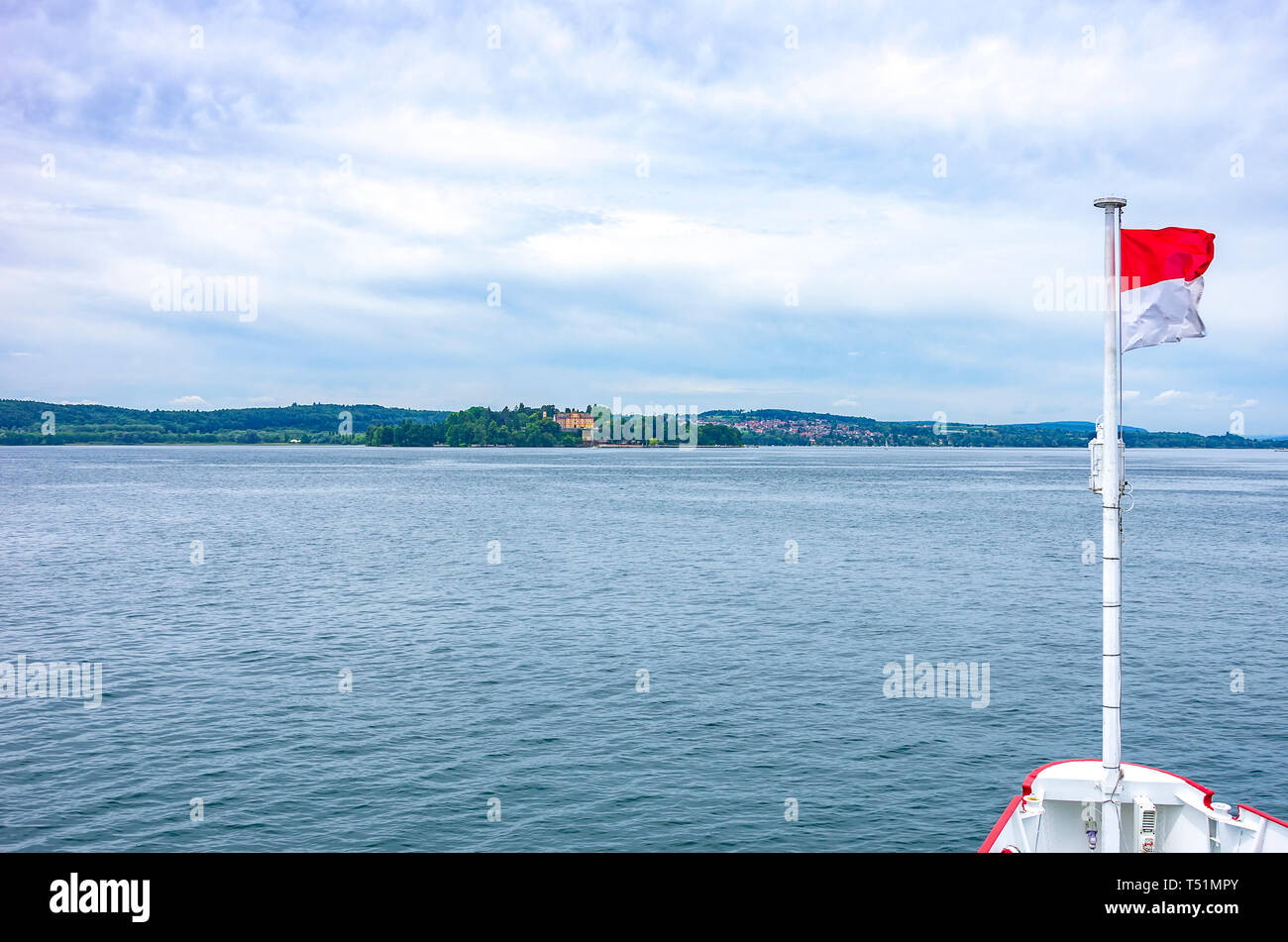 An excursion boat is on course to the Flower Island Mainau in Lake Constance, Germany, Europe. Stock Photo