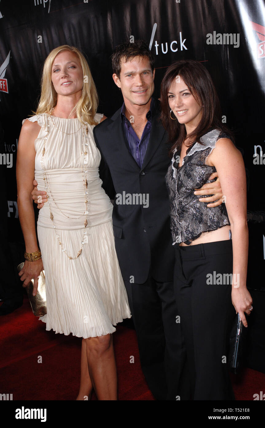 LOS ANGELES, CA. September 10, 2005: Actress JOELY RICHARDSON (left) & actor DYLAN WALSH & wife actress JOANNA GOING at the premiere for season three of the TV series Nip/Tuck, at the El Capitan Theatre, Hollywood. © 2005 Paul Smith / Featureflash Stock Photo