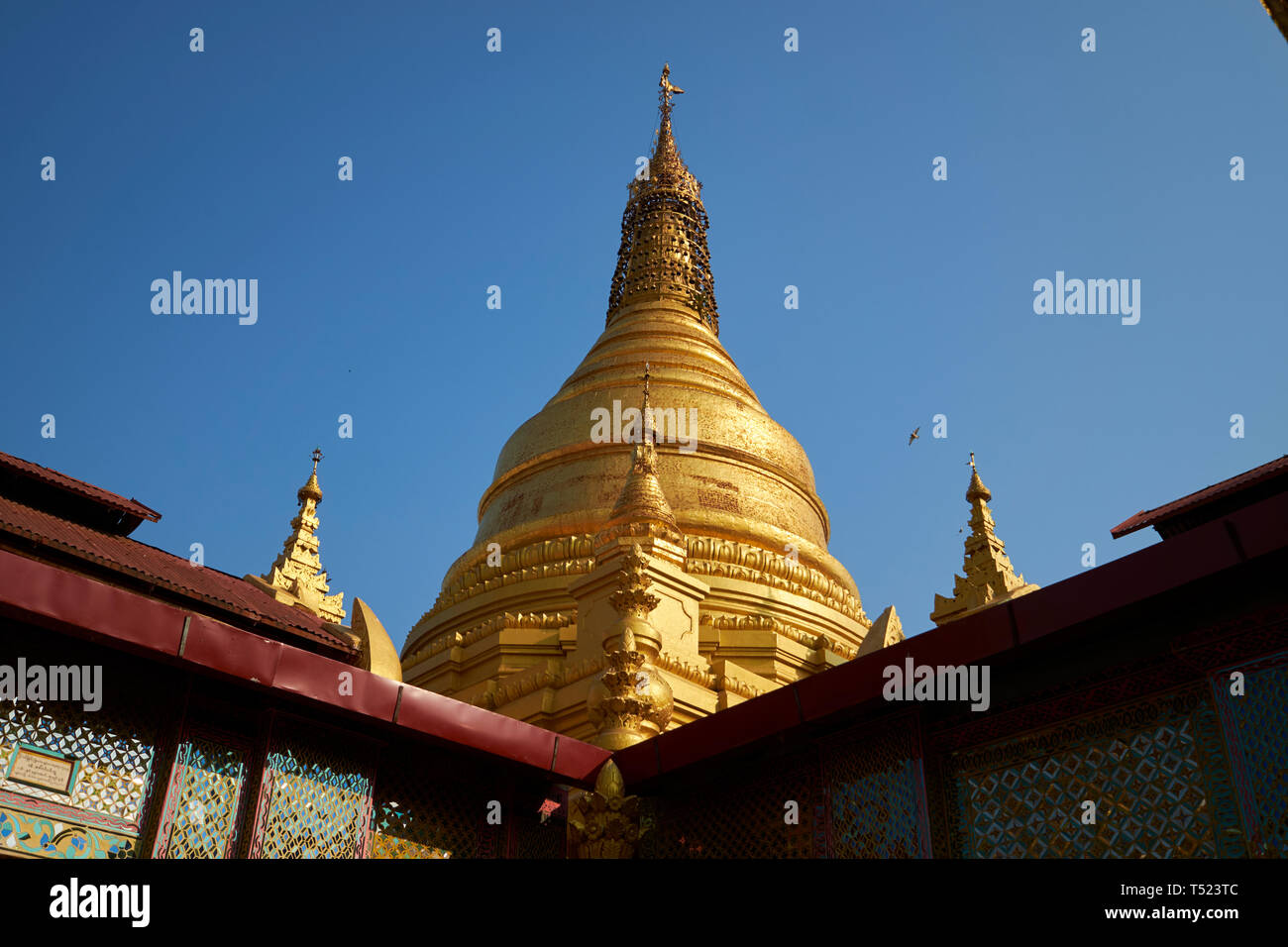 The beautiful gold stupa on the Su Taung Pyae pagoda at the top of ...