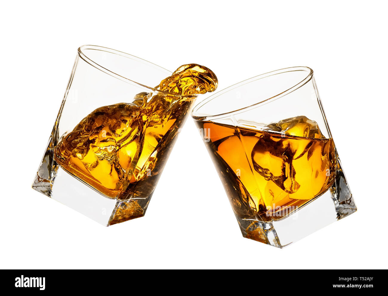 glasses of whiskey making toast Stock Photo Alamy