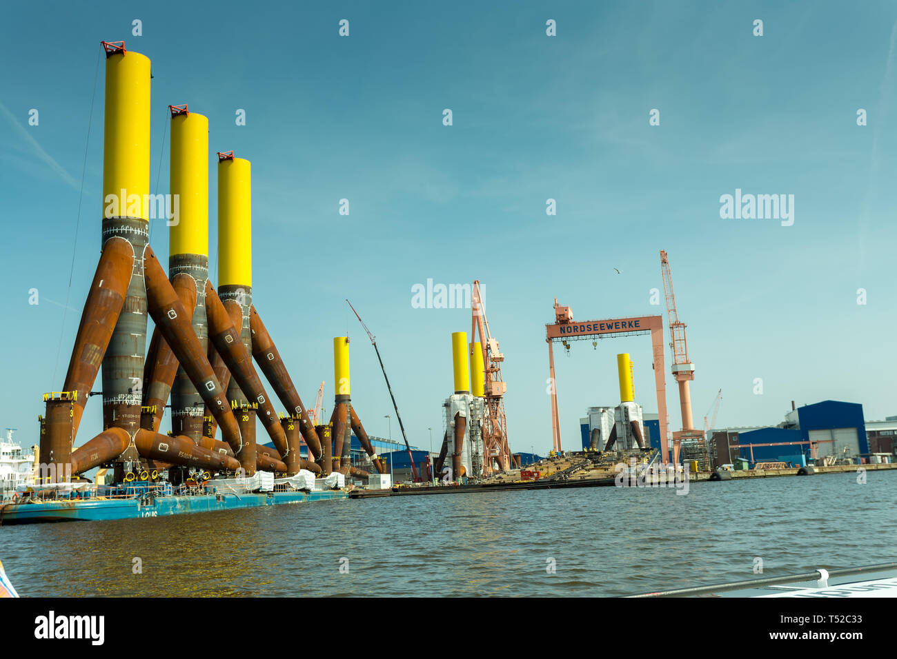 Emden, GERMANY - base construction for offshore wind mill energy park Stock Photo