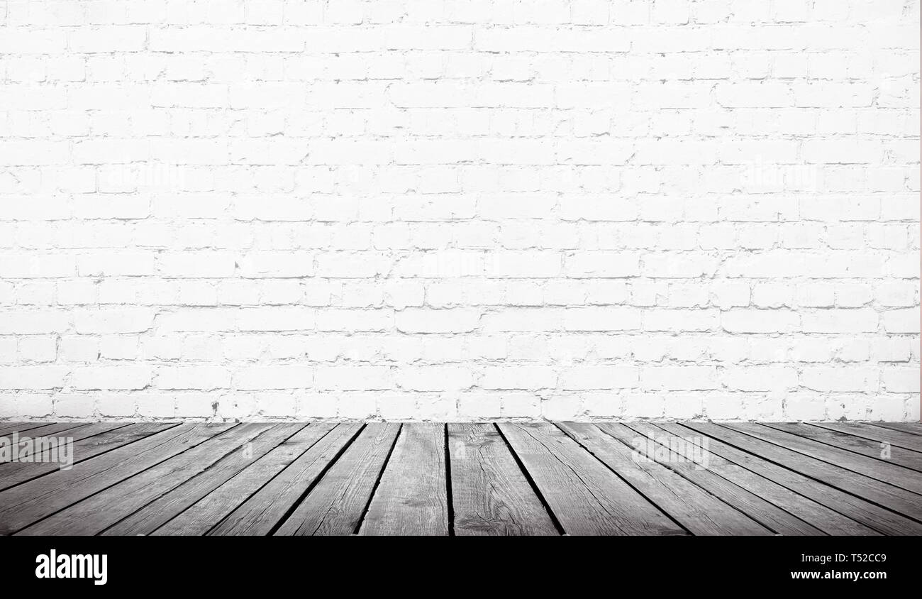 table over white brick wall background, template Stock Photo