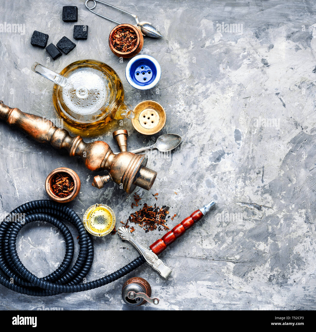 East smoking hookah. Arabian shisha with tea. Hookah and tea Stock