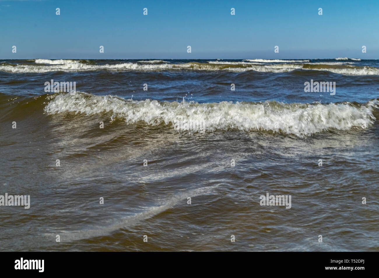 Landscape with sea waves and blue sky Stock Photo - Alamy