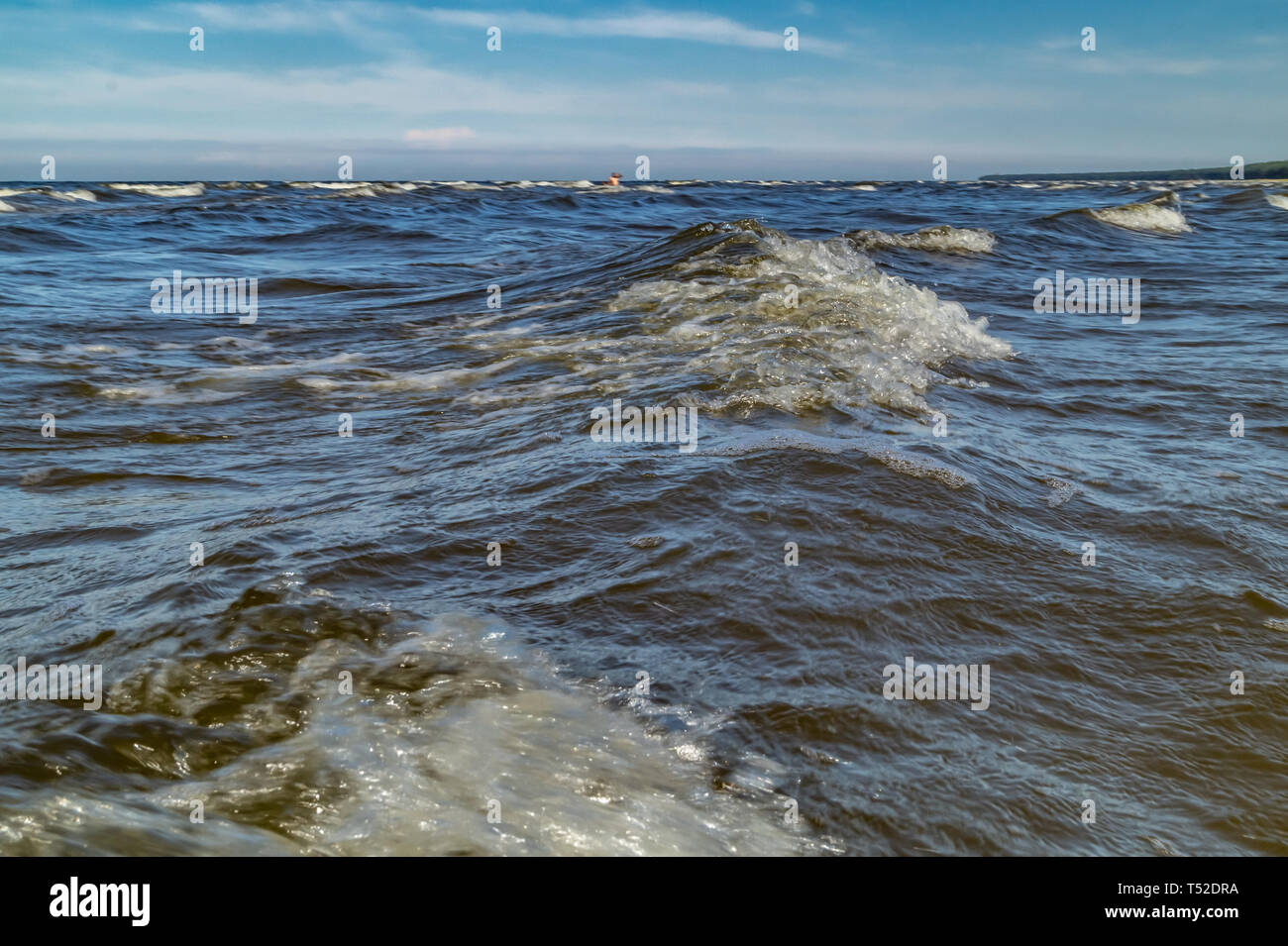 Landscape with sea waves and blue sky Stock Photo - Alamy