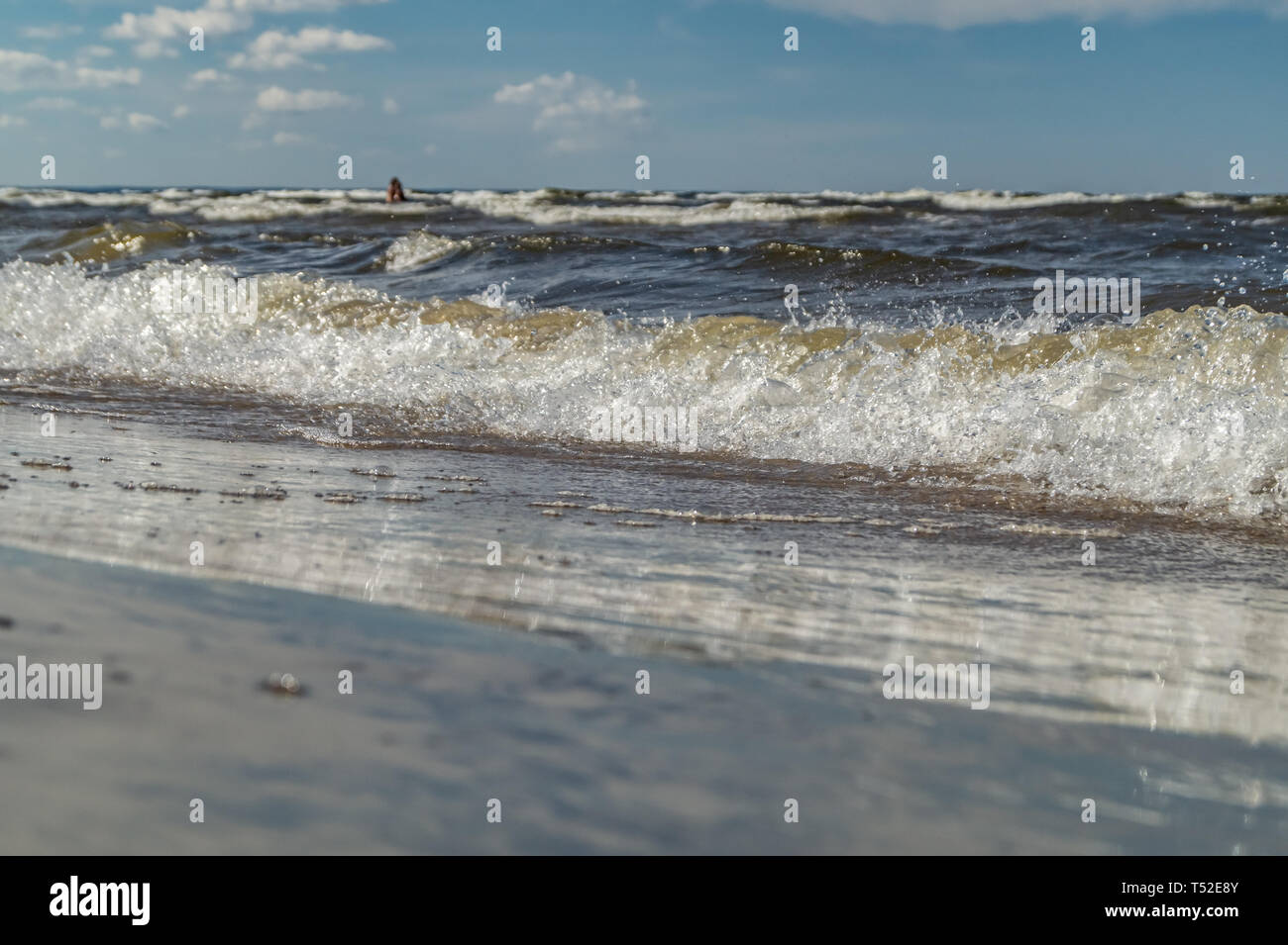 Landscape with sea waves and blue sky with white puffy clouds Stock ...