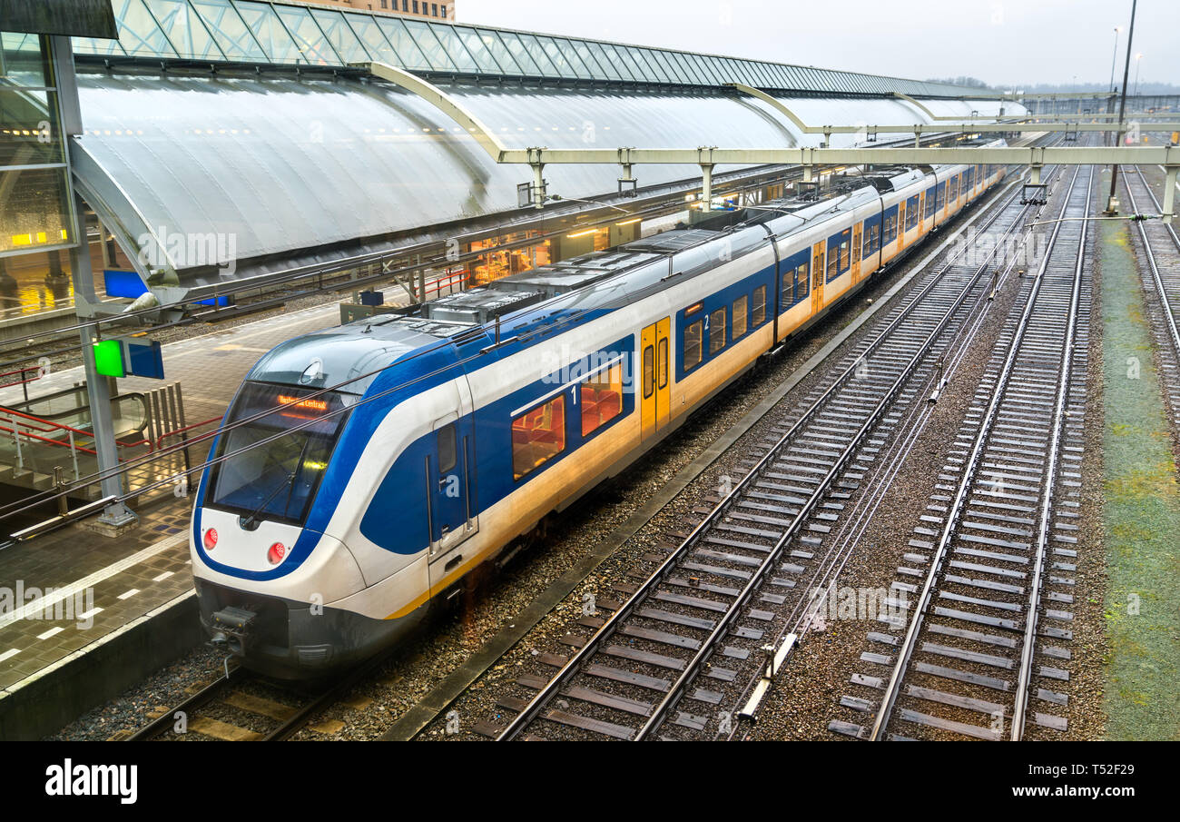 Passenger train at Amersfoort station in the Netherlands Stock Photo