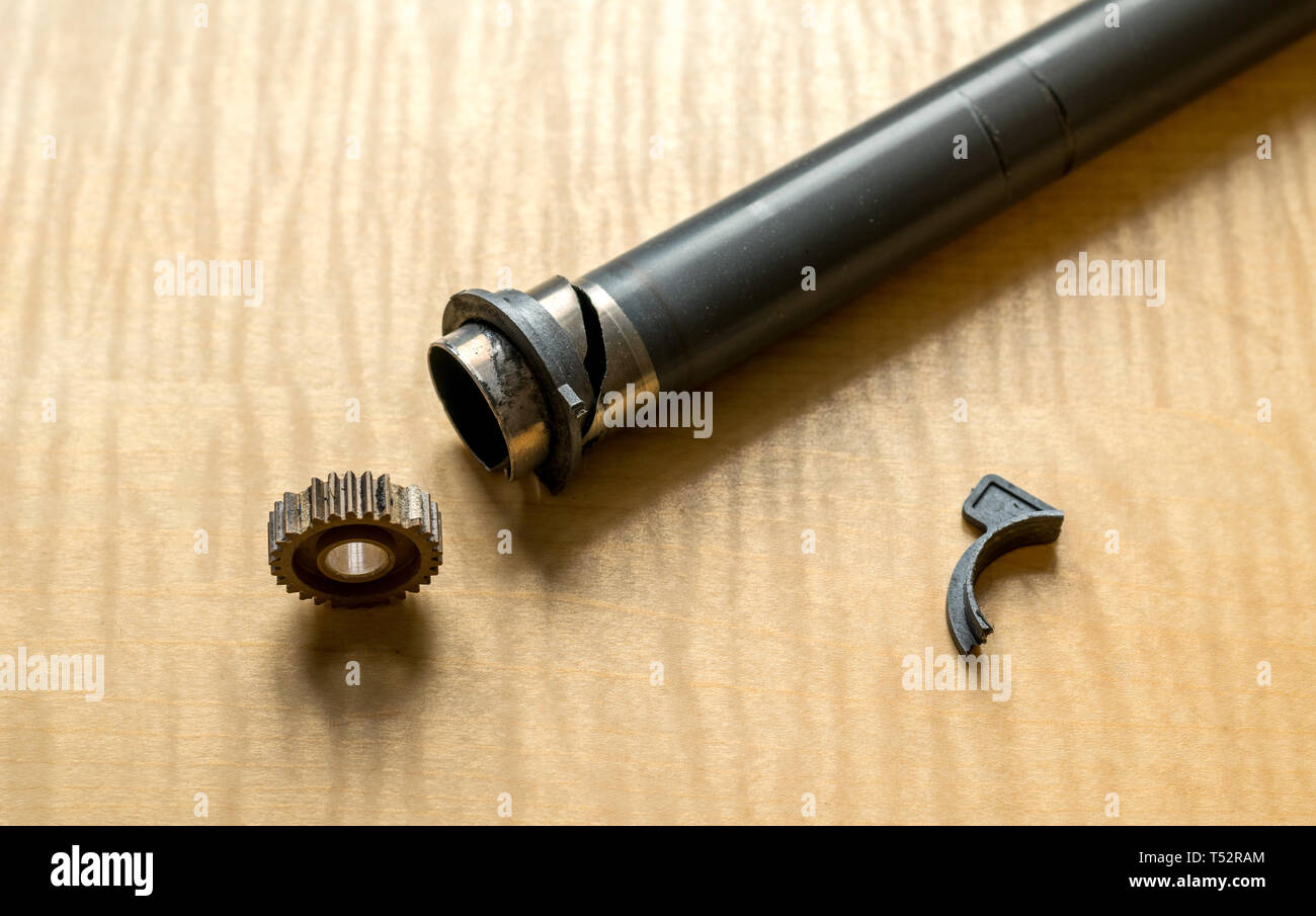 defective parts, broken gear, shaft and bearing from printer Stock