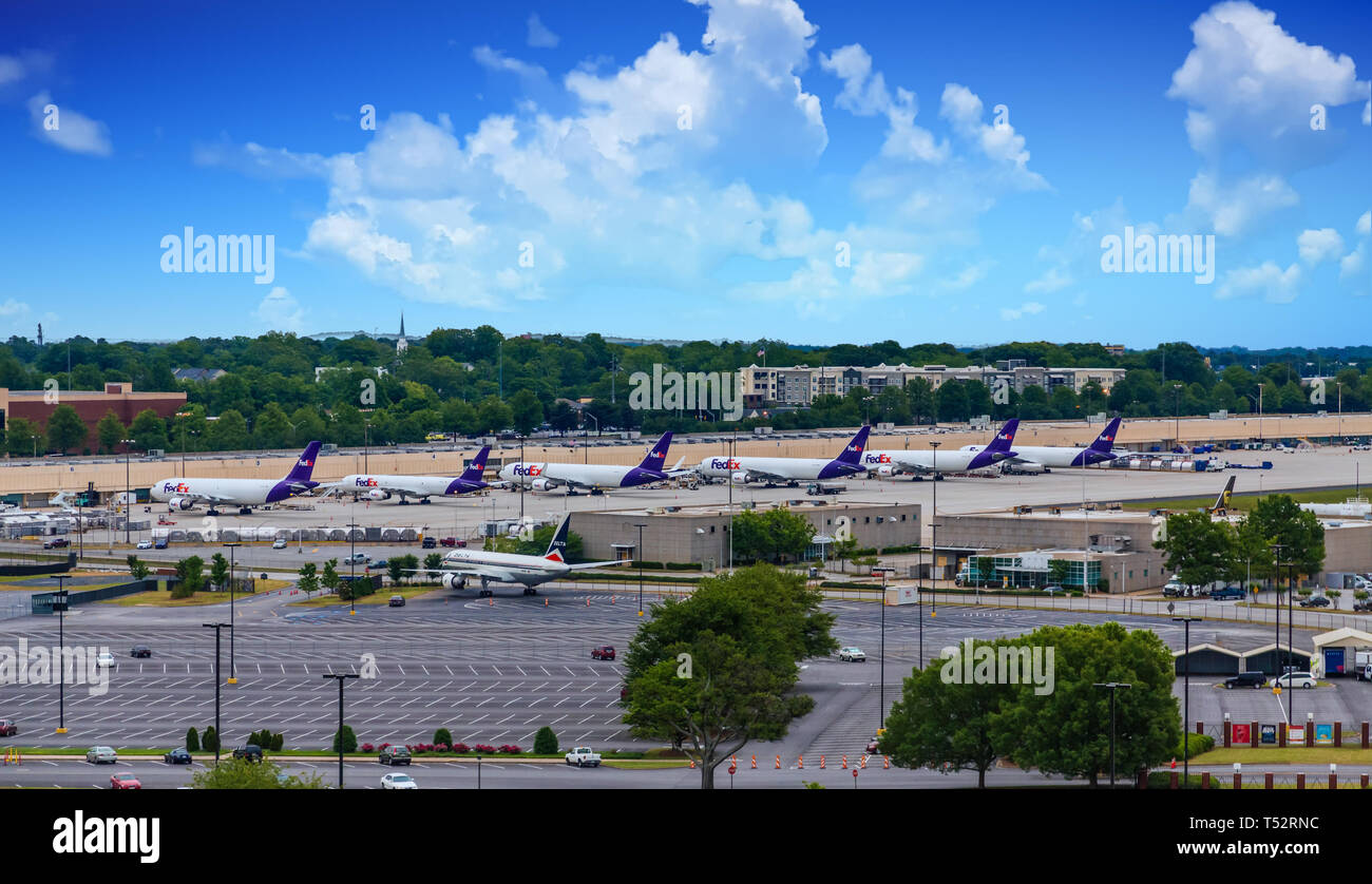 ATLANTA, GEORGIA - May 9, 2016: FedEx Corporation is an American multinational courier delivery services company headquartered in Memphis, Tennessee. Stock Photo