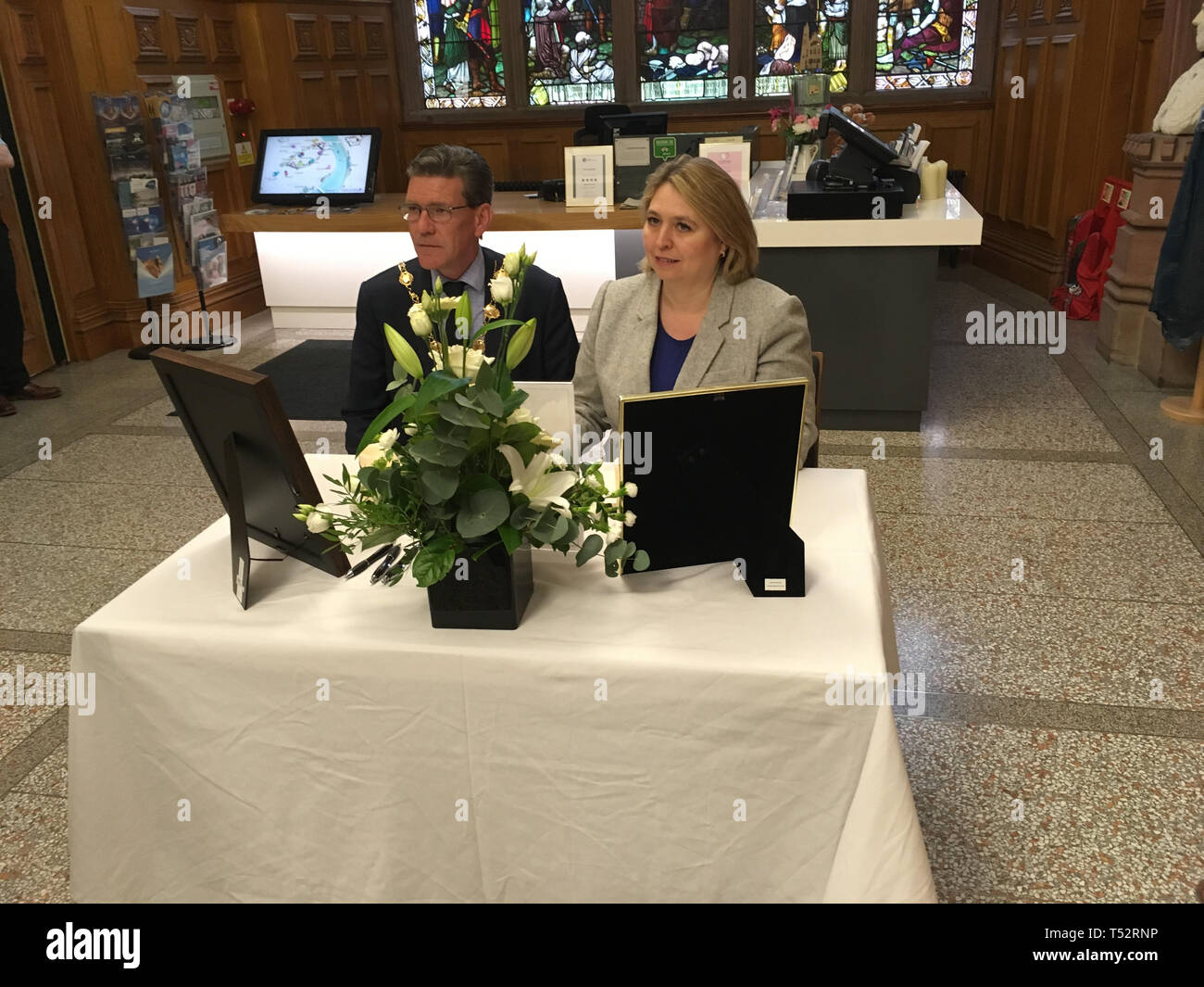Lord Mayor of Londonderry John Boyle and Secretary of State for Northern Ireland Karen Bradley in the Guildhall in Londonderry. Mrs Bradley was one of the first to sign a book of condolence in honour of murdered journalist Lyra McKee inside the Guildhall on Saturday morning. Stock Photo