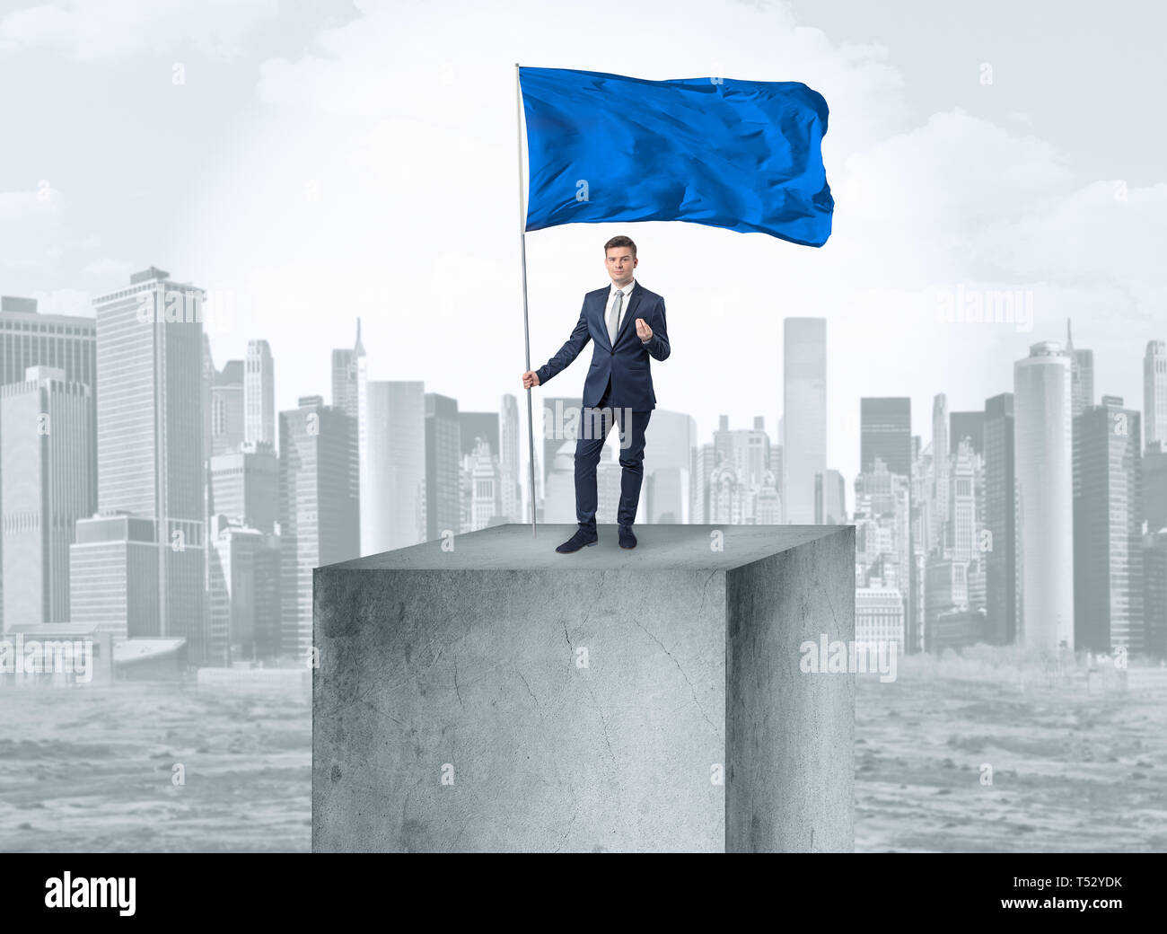 Handsome businessman on the top of the city with blue flag Stock Photo ...