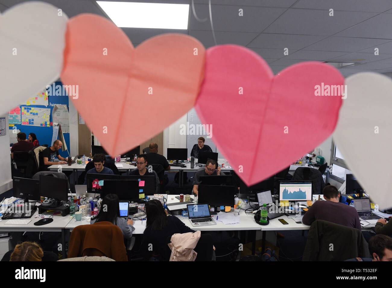 *** FRANCE OUT / STRICTLY NO SALES TO FRENCH MEDIA *** November 23, 2018 - Paris, France: Employees in the office of Happn, a French start-up that developed a dating app allowing users to meet people based on their geolocalisation patterns. Reportage dans les bureaux de Happn, une start-up parisienne connue pour son app de rencontre basee sur la geolocalisation. Stock Photo
