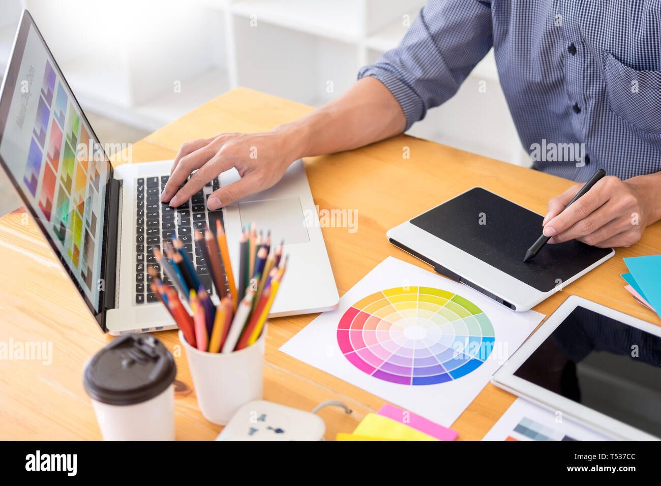 team interior designer drawing a new project using graphic computer and ...