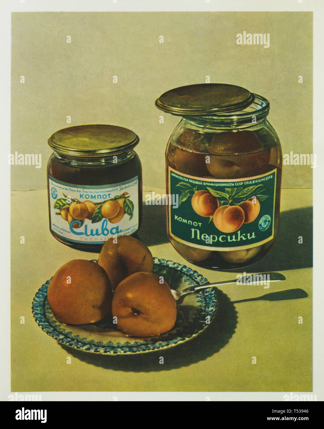 Soviet canned cherry plum kompot and canned peach kompot depicted in the colour illustration in the Book of Tasty and Healthy Food published in the Soviet Union (1953). Stock Photo