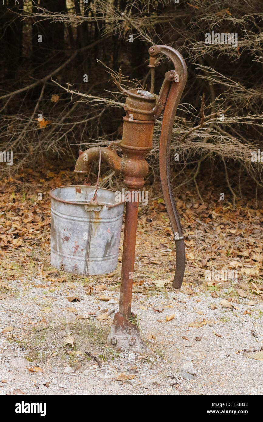 Water Pump at The Old Baily School House. 1907-1941. A one-room log schoolhouse built in 1907. It is now part of Sturgeon Point State Park. Harrisvill Stock Photo