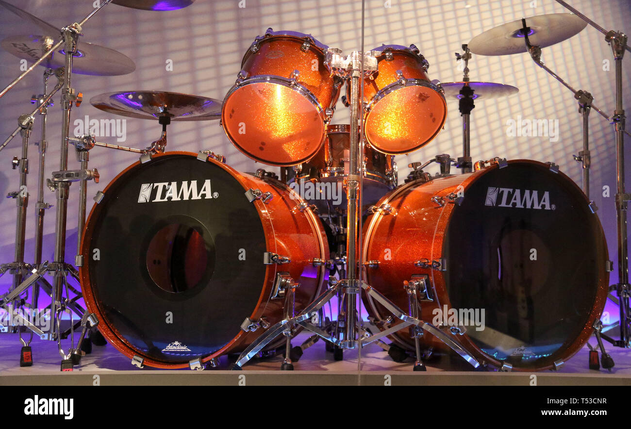 April 20, 2019 - New York City, New York, U.S. - TAMA DRUM SET STARCLASSIC  LARS ULRICH (from METALLICA) signature 7 piece Magnetic Orange finish with  cymbals on display at the 'Play