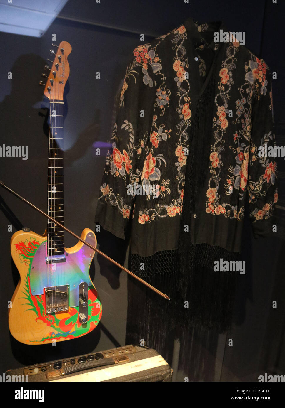 April 20, 2019 - New York City, New York, U.S. - Costume and 'DRAGON' Telecaster Fender Electric Guitar with violin bow owned by JIMMY PAGE on display at the 'Play It Loud: Instruments of Rock and Roll' exhibit held at the Metropolitan Museum of Art. Guitar was a gift from Jeff Beck to Jimmy Page, who added artwork. (Credit Image: © Nancy Kaszerman/ZUMA Wire) Stock Photo