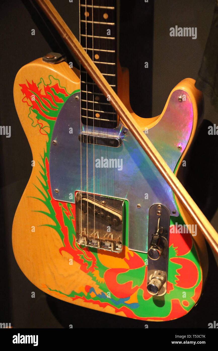 April 20, 2019 - New York City, New York, U.S. - 'DRAGON' Telecaster Fender Electric Guitar with violin bow owned by JIMMY PAGE on display at the 'Play It Loud: Instruments of Rock and Roll' exhibit held at the Metropolitan Museum of Art. Guitar was a gift from Jeff Beck to Jimmy Page, who added artwork. (Credit Image: © Nancy Kaszerman/ZUMA Wire) Stock Photo