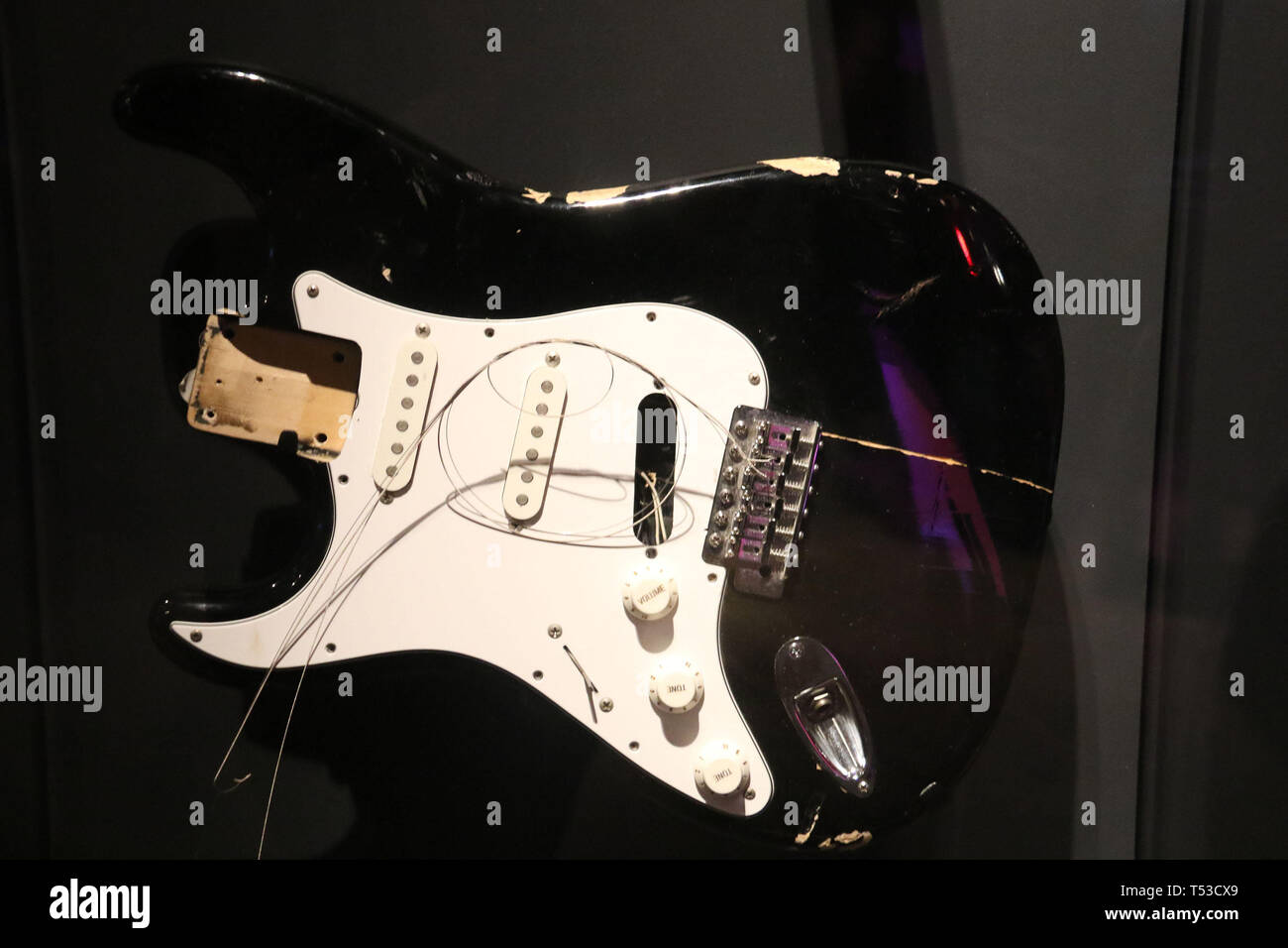 April 20, 2019 - New York City, New York, U.S. - STRATOCASTER Left-handed Fender Electric Guitar destroyed by Kurt Cobain of NiRVANA during the 1993  tour, on display at the 'Play It Loud: Instruments of Rock and Roll' exhibit held at the Metropolitan Museum of Art. (Credit Image: © Nancy Kaszerman/ZUMA Wire) Stock Photo