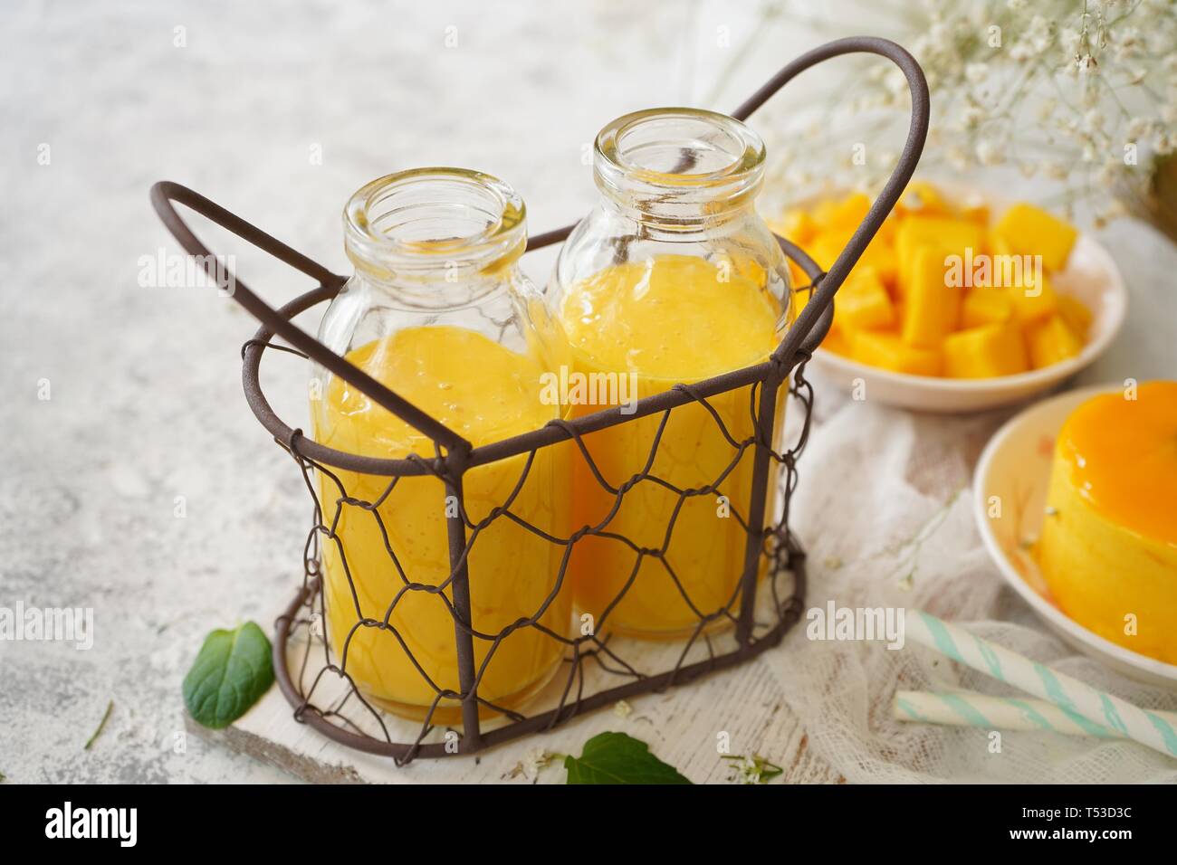 Mango Lassi / Indian mango yogurt drink, selective focus Stock Photo