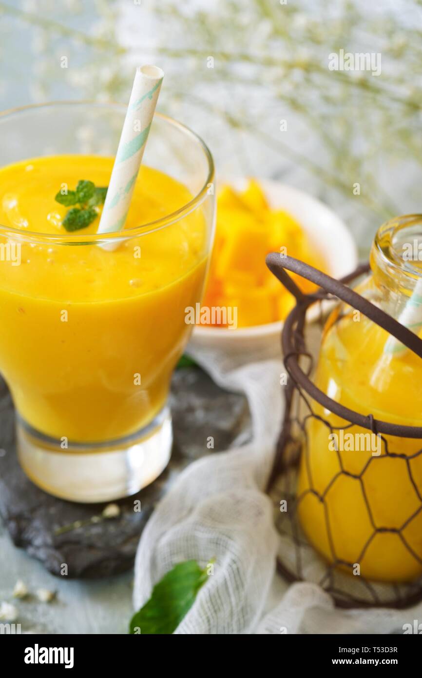 Mango Lassi / Indian mango yogurt drink, selective focus Stock Photo