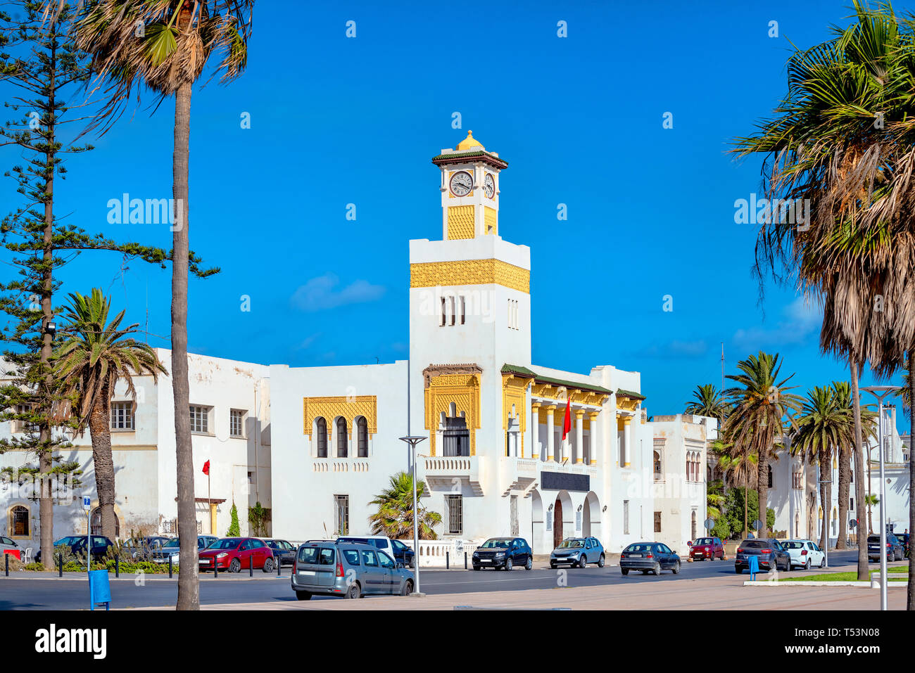 Street with urban clock tower in Essaouira. Morocco, North Africa Stock Photo