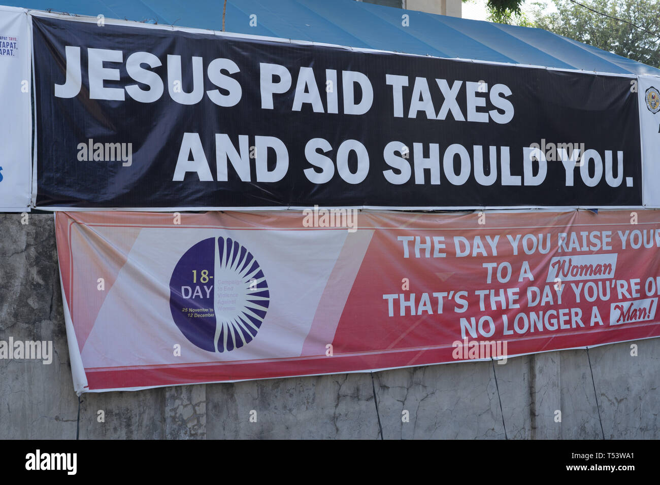 A sign displayed outside of the Bureau of Inland Revenue Ofiices,Cebu City,reminding people to pay their taxes. Stock Photo