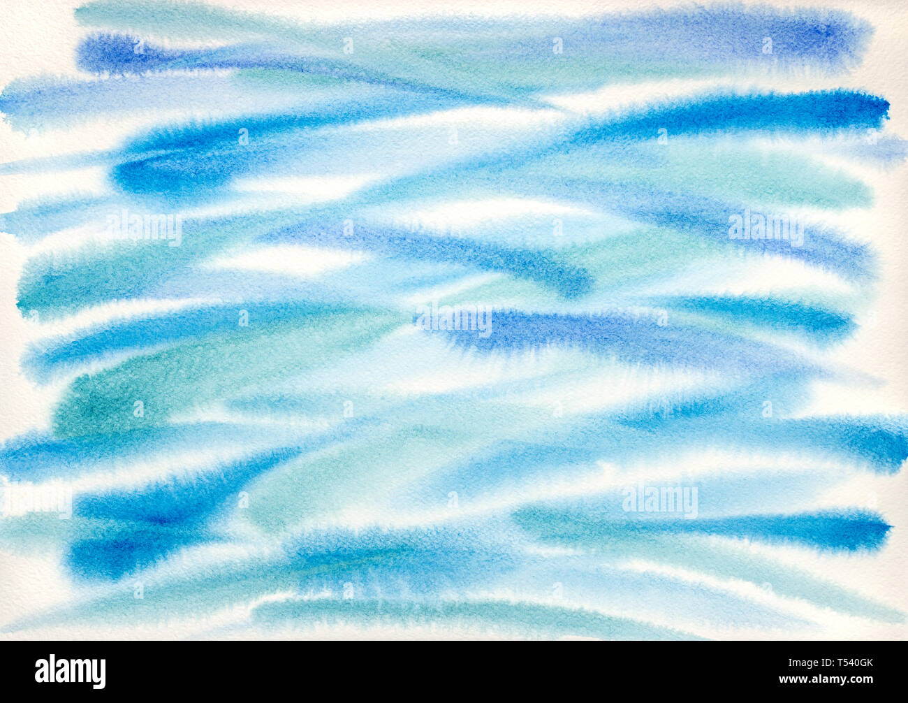 abstract blue and green paint brushstrokes on white watercolor paper Stock Photo