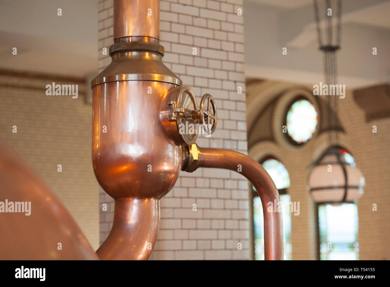 beer's alembic pot  in the factory in Amsterdam Stock Photo