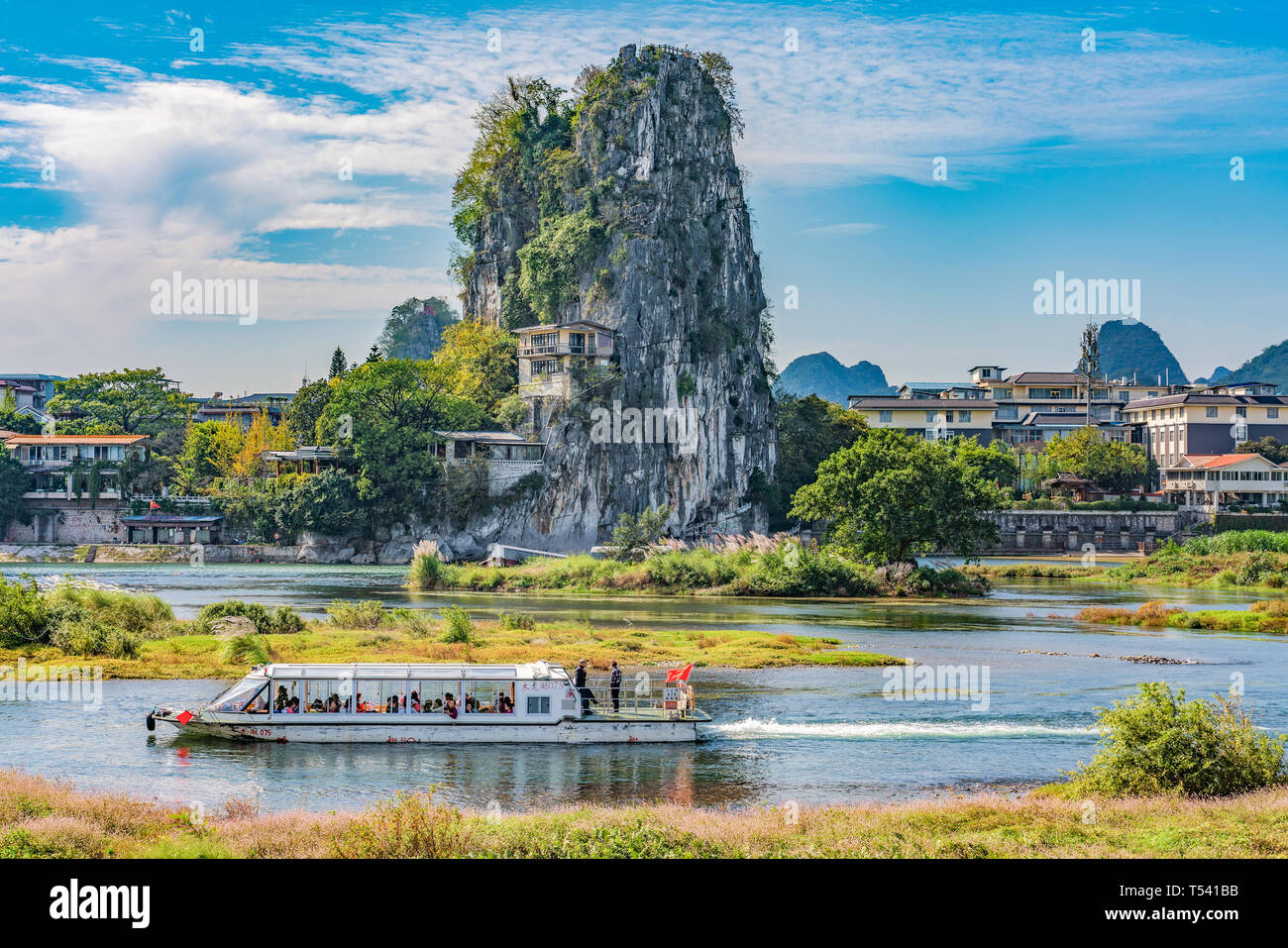 GUILIN, CHINA - NOVEMBER 01: Scenic view of Fubo hill and tour boat cruise along the Li river on November 01, 2018 in Guilin Stock Photo