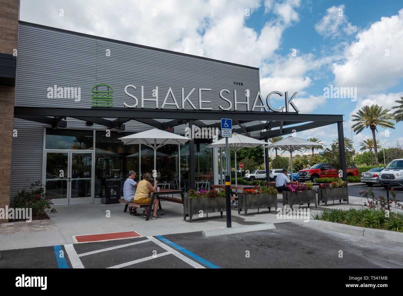 Orlando, FL/United States - 04/18/2019:Shake Shack is an American fast casual restaurant chain based in New York City that specializes in hamburgers. Stock Photo