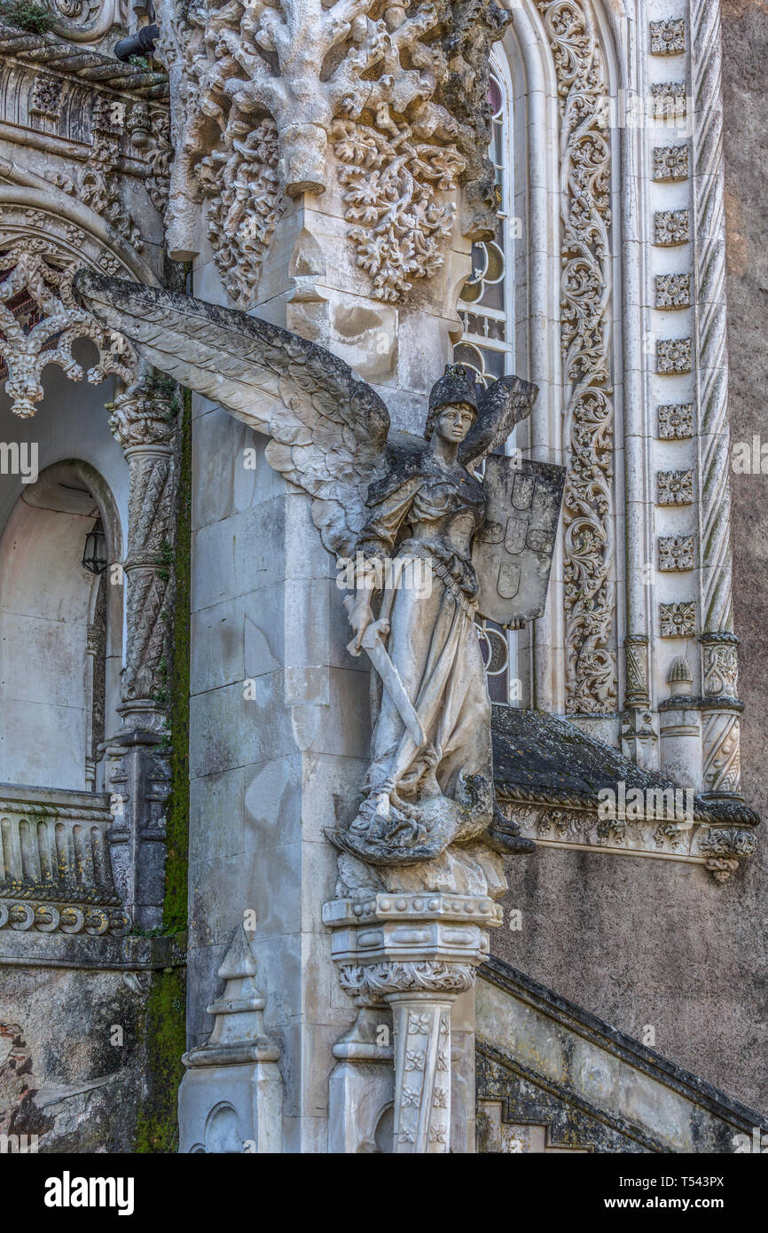 Detail view of a statue on Bussaco Palace, building of neogothic architecture, nineteenth century, located in Portugal Stock Photo