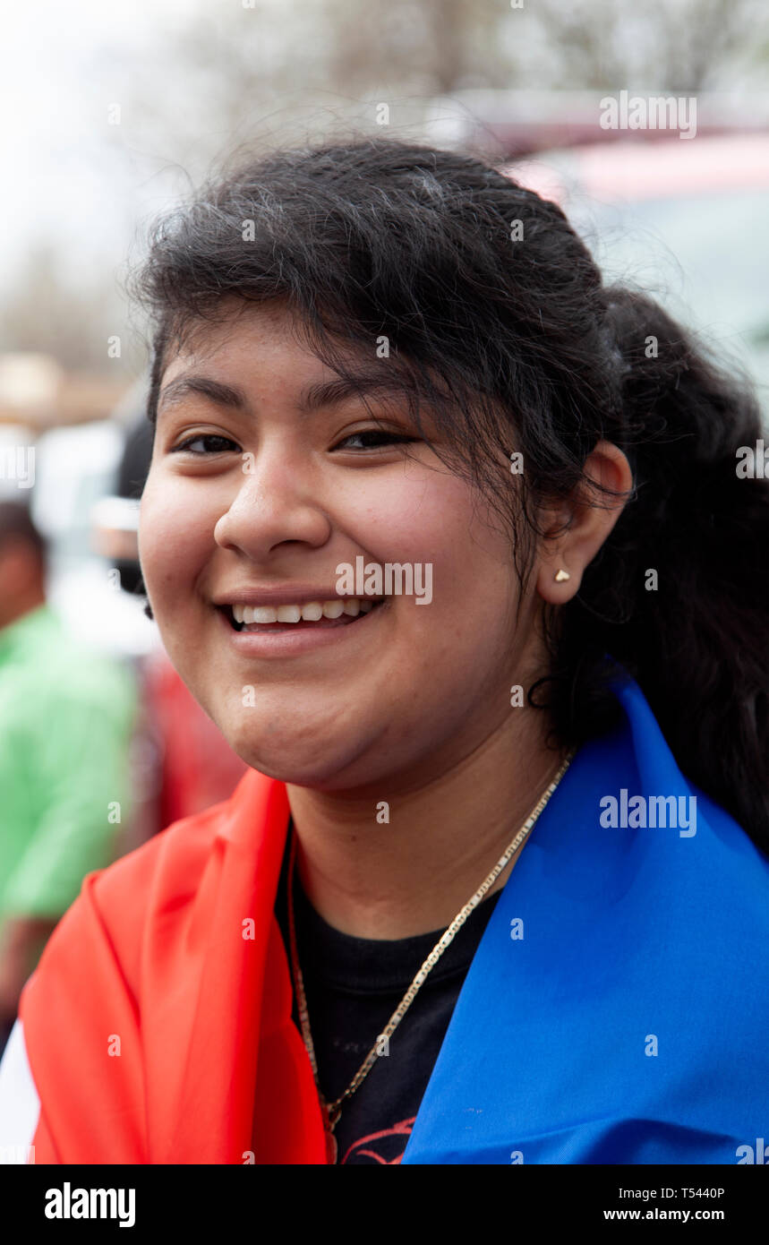 Hispanic teenage girl smiling at the Cinco de Mayo Parade. St Paul Minnesota MN USA Stock Photo
