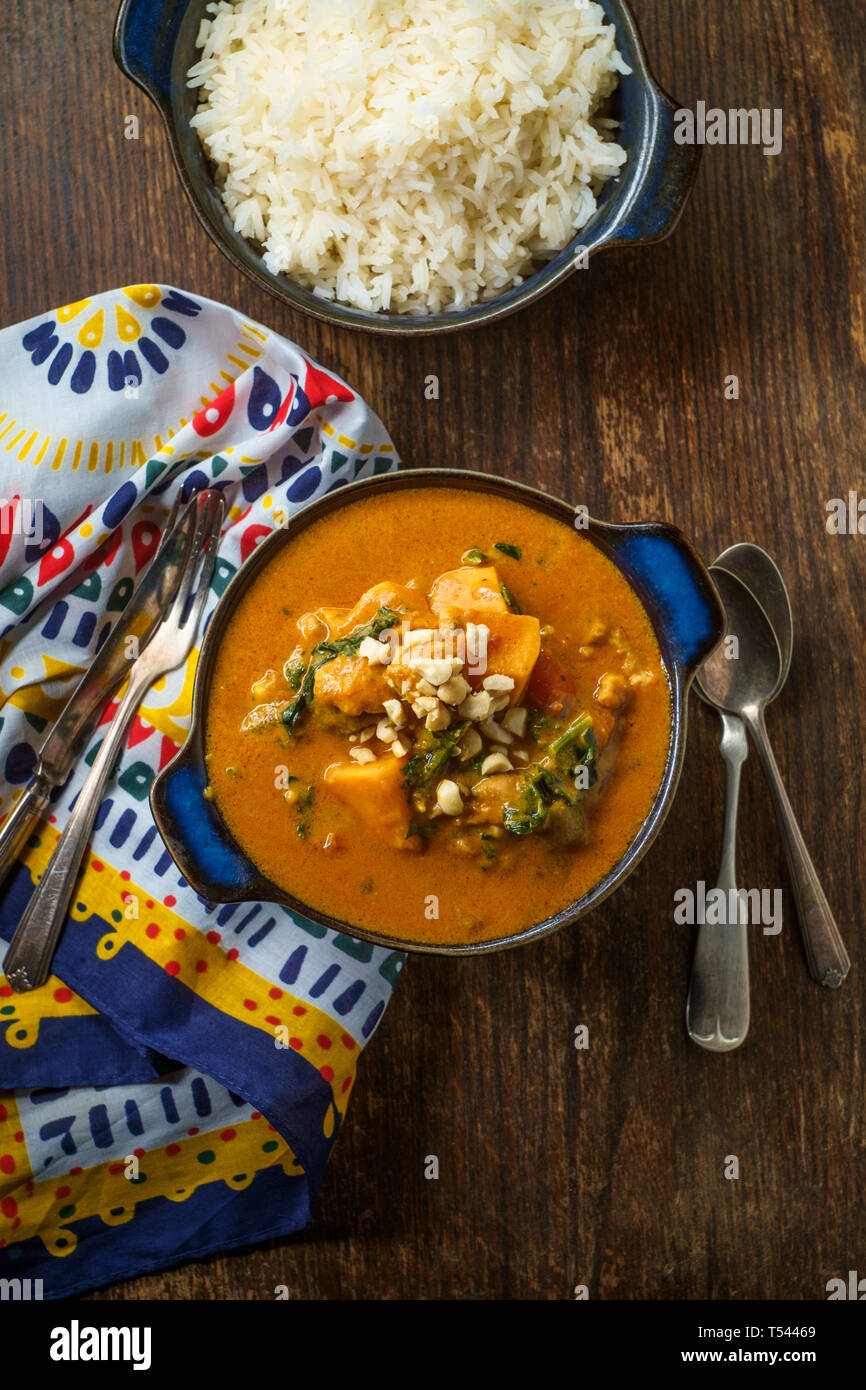 African chicken peanut stew with sweet potatoes and okra with side of