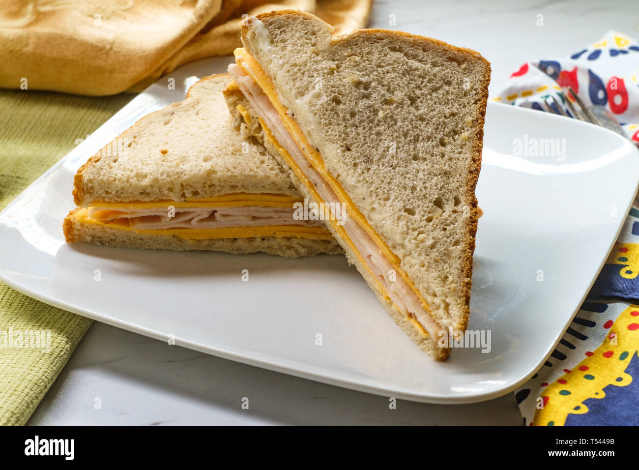 Plain cheese turkey and mayonnaise sandwich on healthy whole wheat