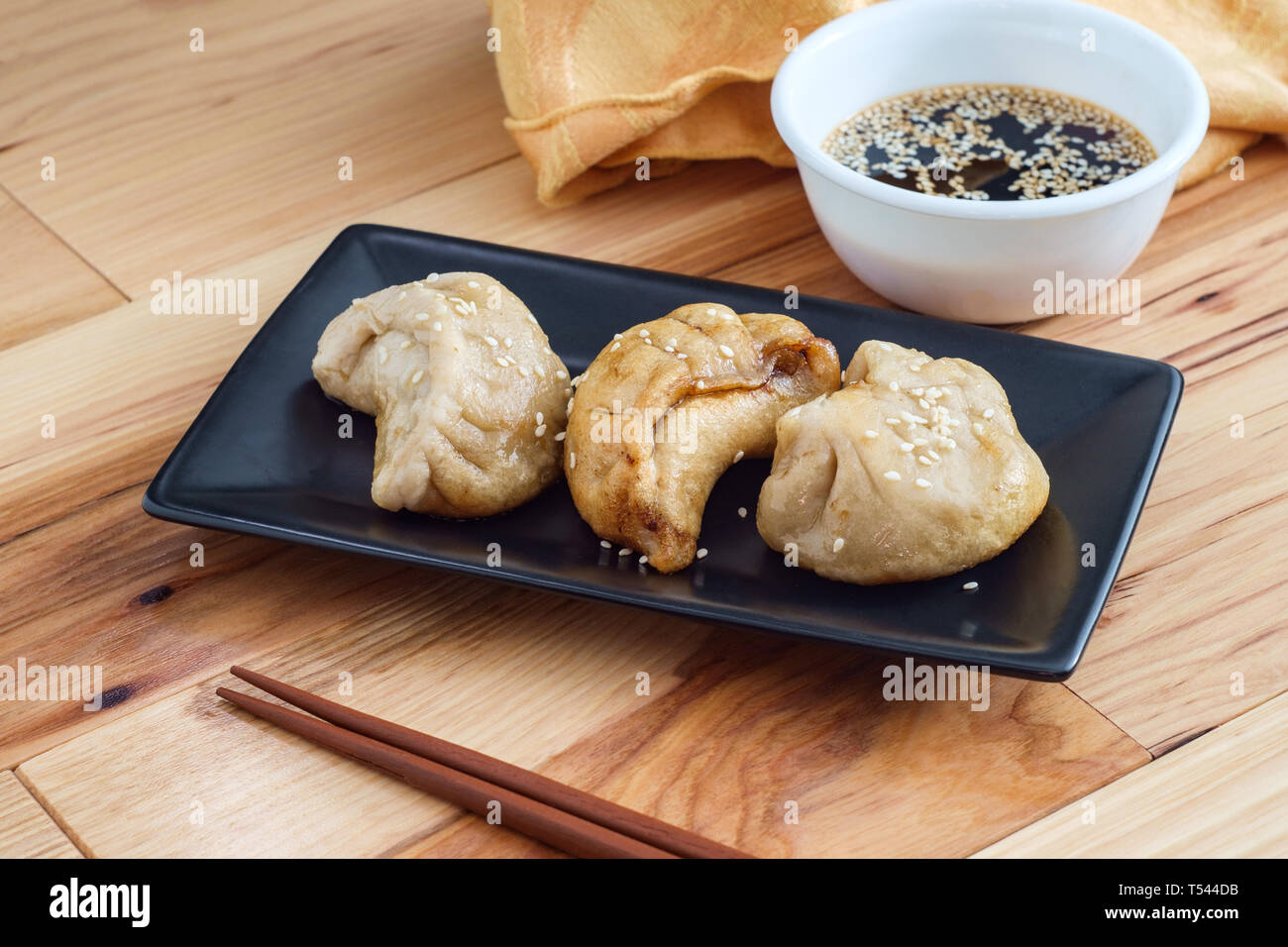 Delicious Chinese Dim Sum dumplings topped with sesame seeds Stock