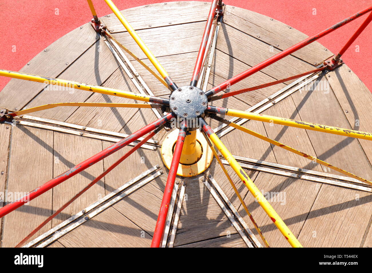 Childrens roundabout at a playground in Hawes, North Yorkshire Stock Photo