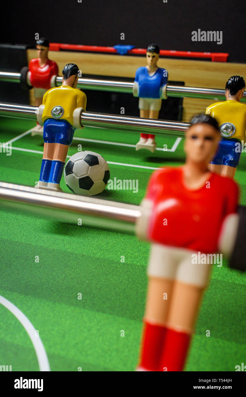 Closeup macro tabletop game of foosball or table football with soccer