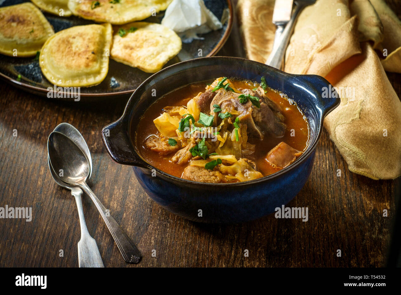 Polish hunters stew known as Bigos with pork loin sausage and lamb neck