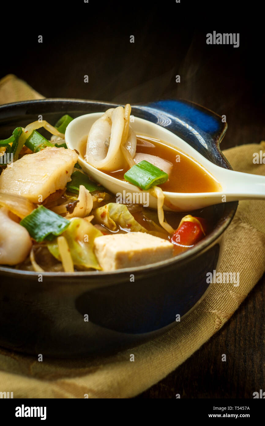Korean seafood stew also called Haemul Jeongol with tofu tilapia