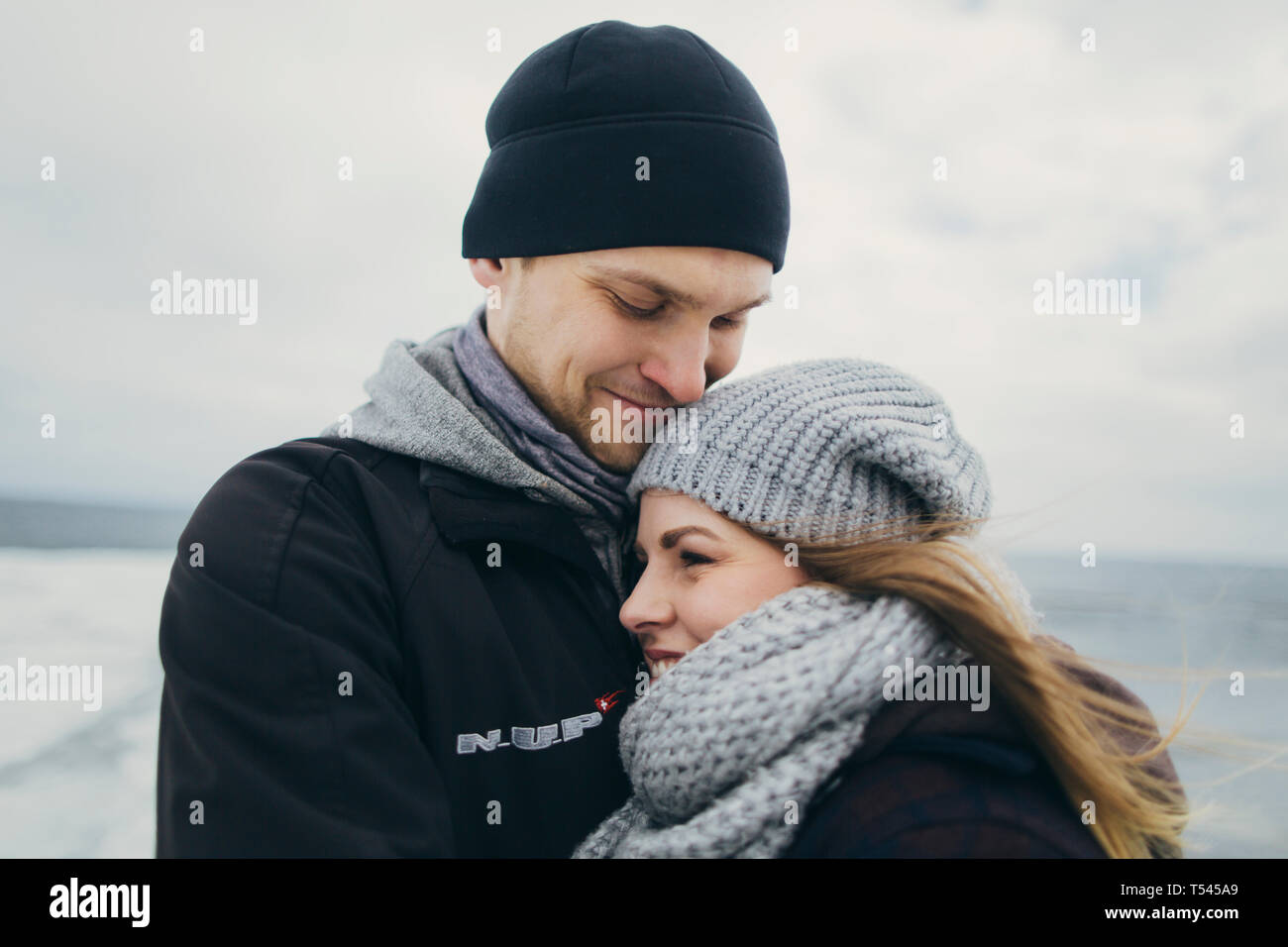 Young couple wearing warm clothing Stock Photo