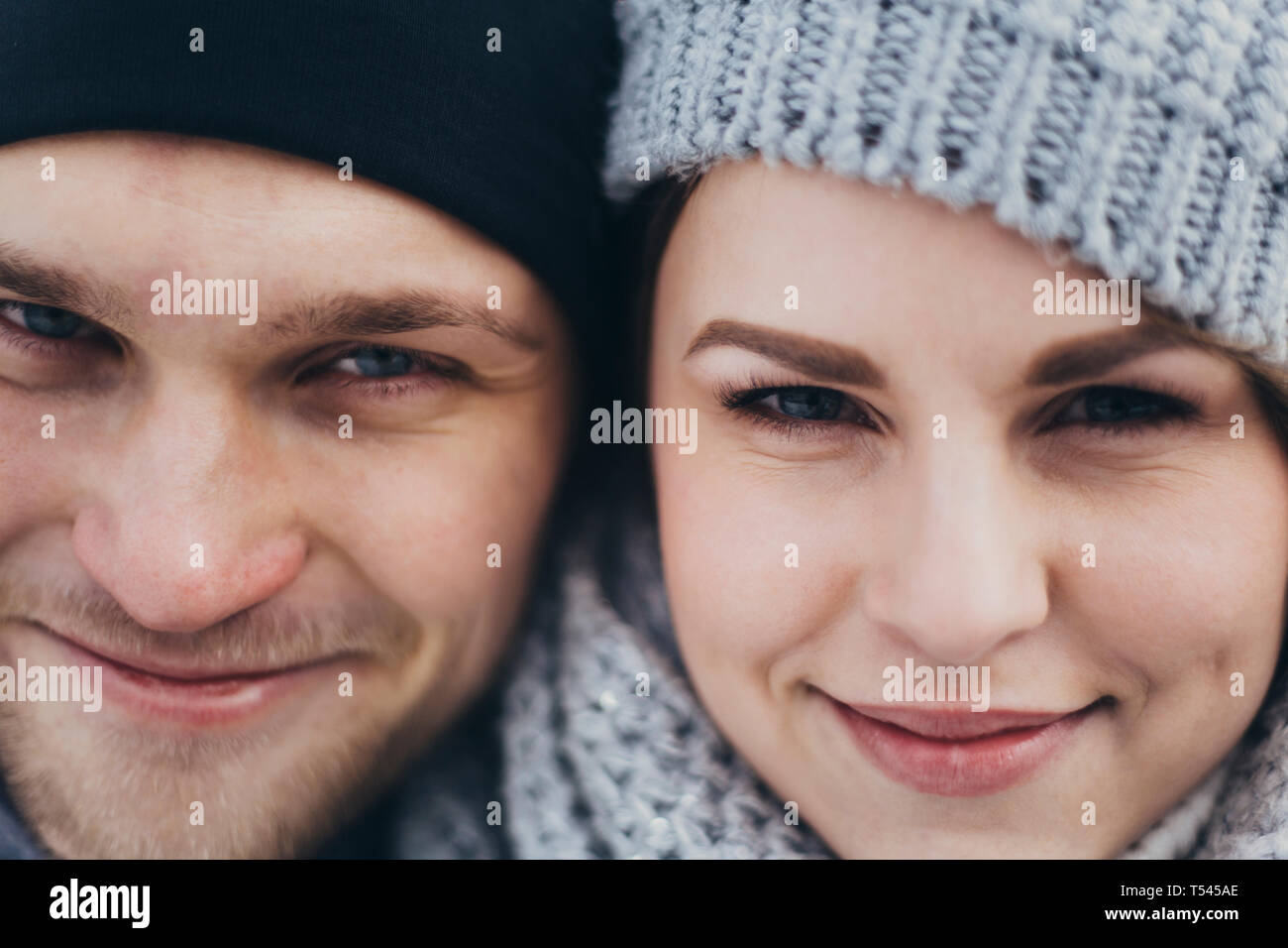 Portrait of young couple wearing woolly hats Stock Photo